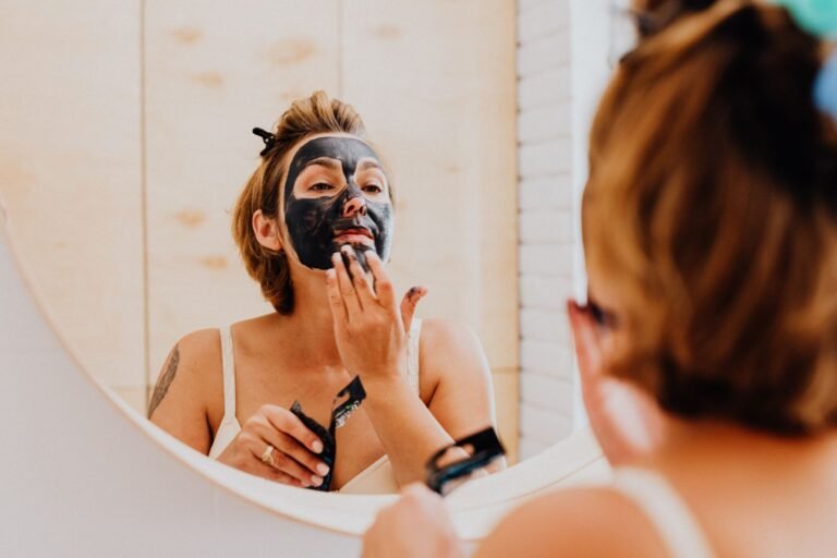 Woman applying herbal facial mask - Lepana Ayurvedic Herbal Paste Therapy Jaipur