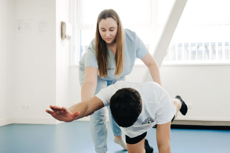 Physiotherapist assisting patient with stretching exercises for paralysis and facial palsy Ayurvedic treatment in Jaipur