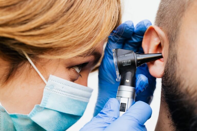 Doctor doing ear examination - Karna Dhoopana Ayurvedic Ear Smoke Therapy Jaipur
